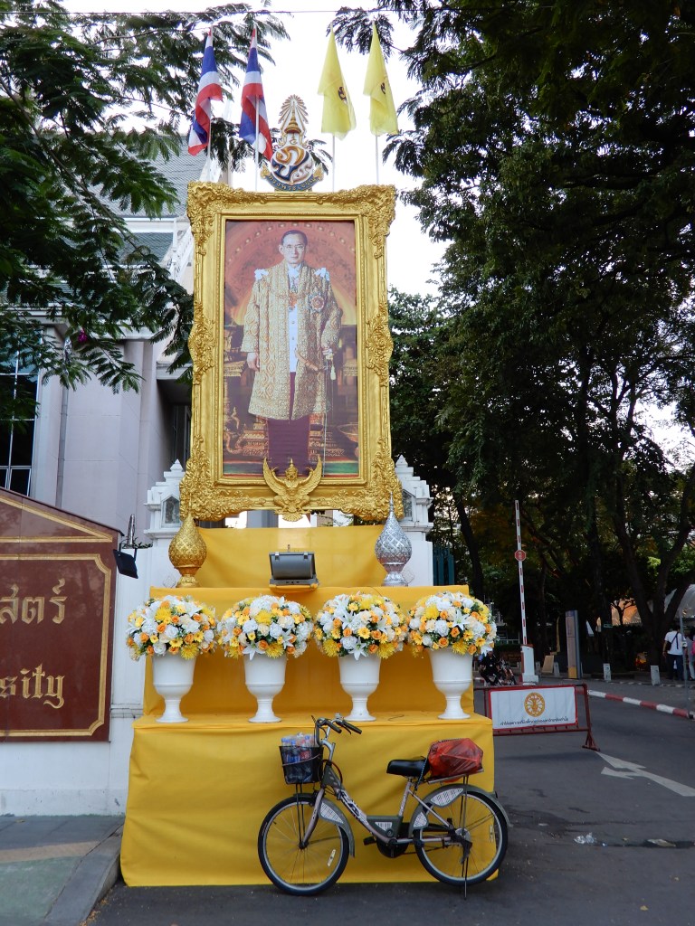 Bangkok - image of the king and bike parked